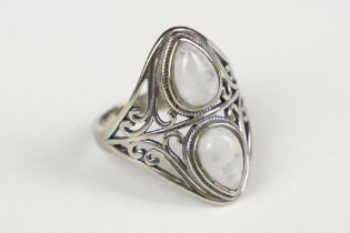 A 925 sterling silver and moonstone ladies ring set with two teardrop moonstones, marked 925 for