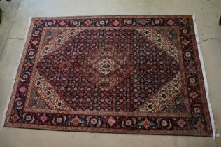 Vintage blue ground Persian Tabriz carpet with traditional medallion design