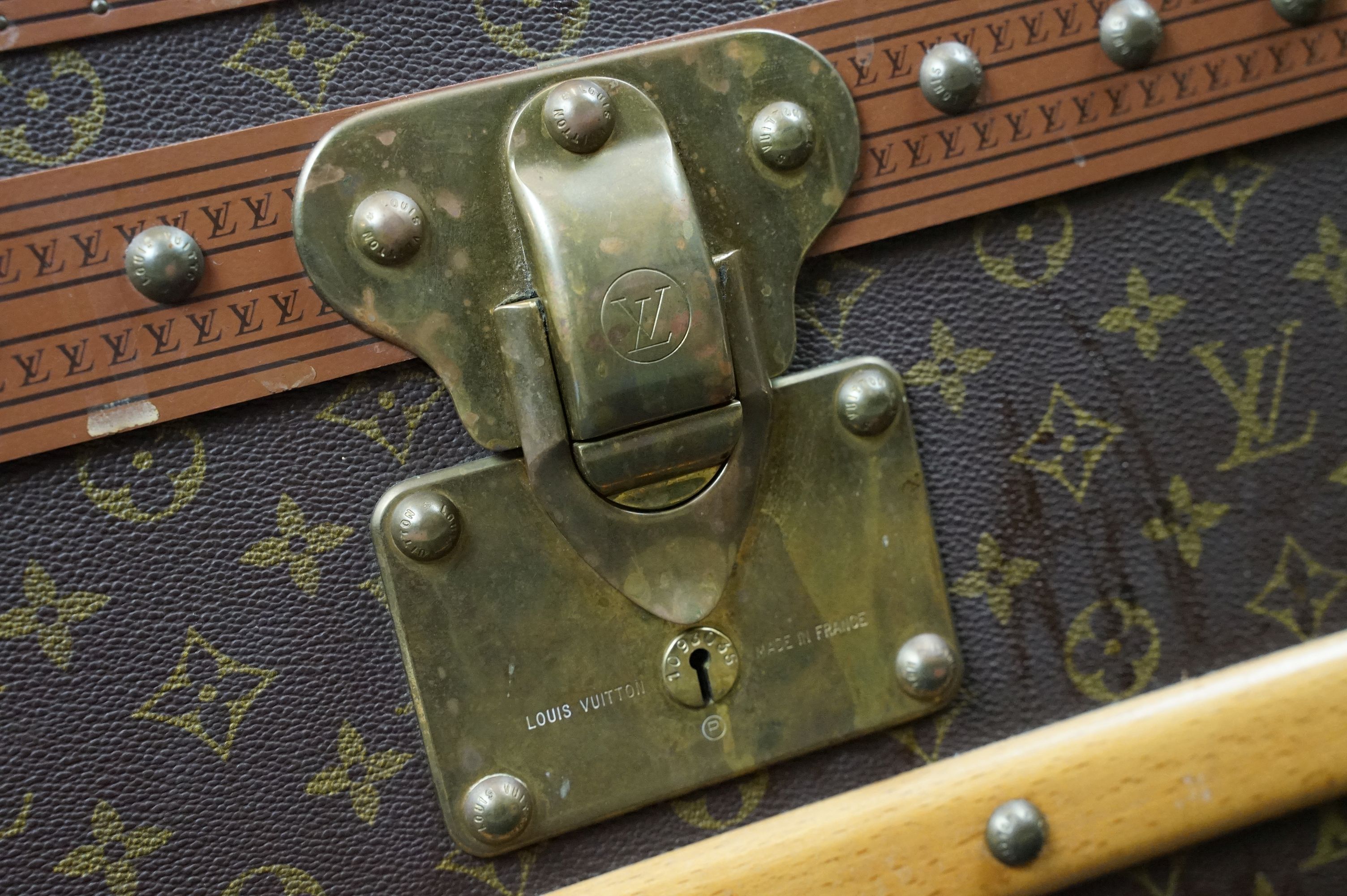 Louis Vuitton - Monogrammed canvas travel trunk having branded leather banding, wooden slats, - Image 13 of 32