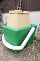 Substantial painted sand castle pier display with green bucket and white handle, fibreglass material