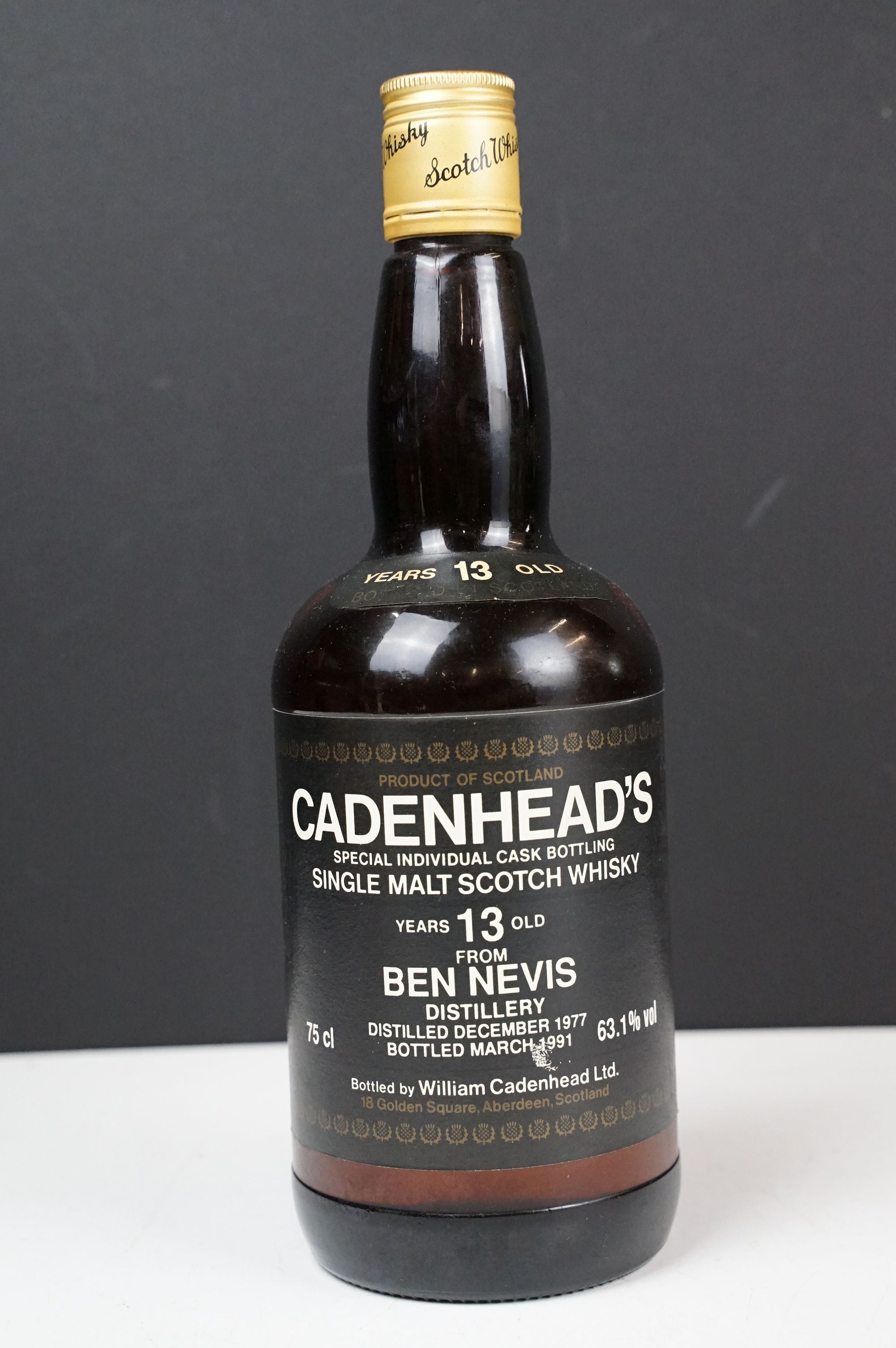 A bottle of Cadenhead's special individual cask bottling single malt scotch whisky. 13 years old