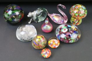 Collection of ten 20th century glass paperweights to include two iridescent glass examples (swan &