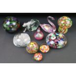 Collection of ten 20th century glass paperweights to include two iridescent glass examples (swan &