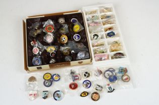 A large collection of football club souvenir pin badges from around the U.K.