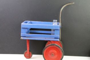 Mid 20th C painted wooden milk cart with slatted sides, raised on three metal wheels, approx 48cm