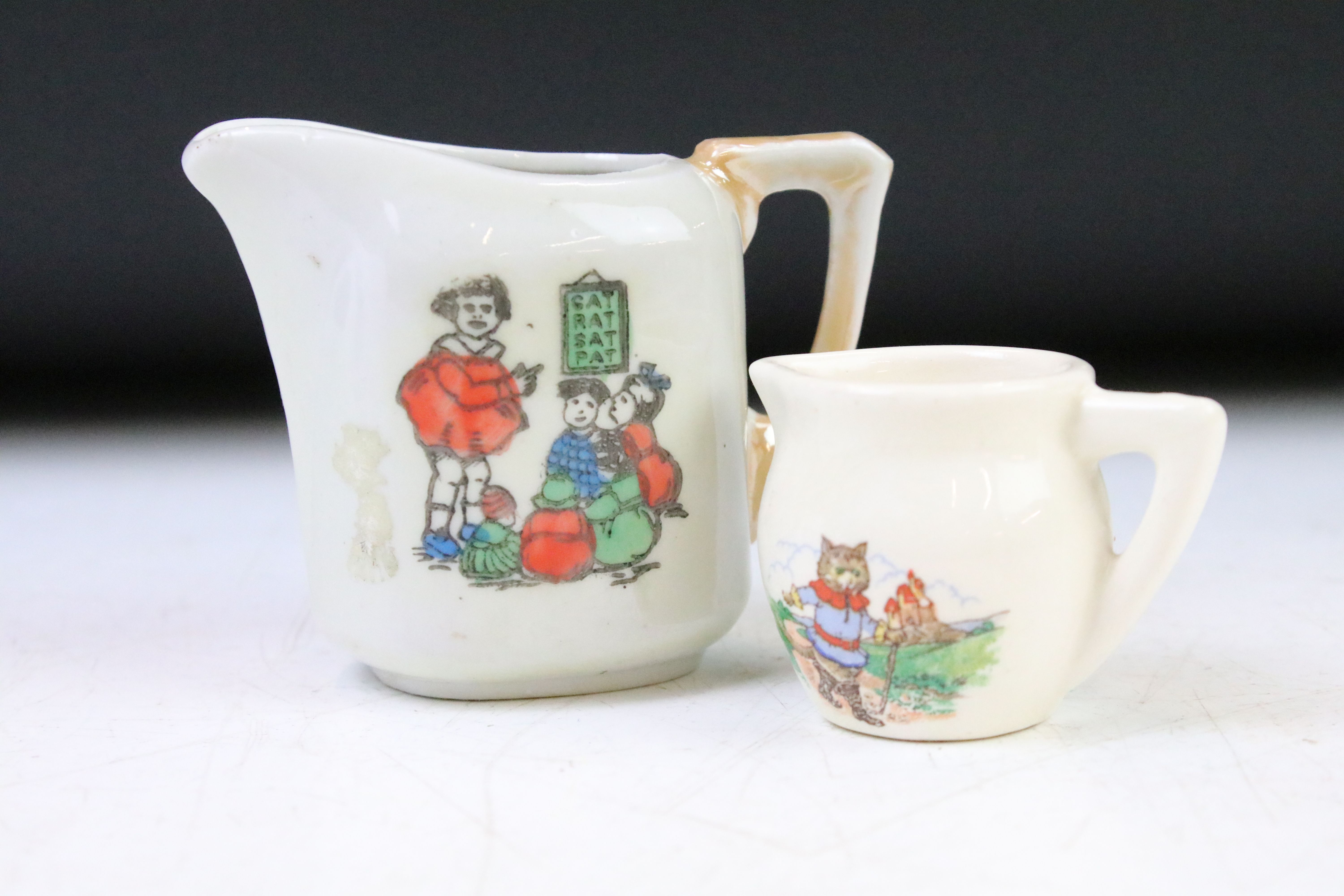 Two vintage porcelain childs tea sets to include a Little Red Riding Hood tea set and a tea set with - Image 8 of 14