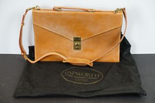 Papworth leather shoulder bag / brief case with yellow metal lock mechanism to front. Papworth label