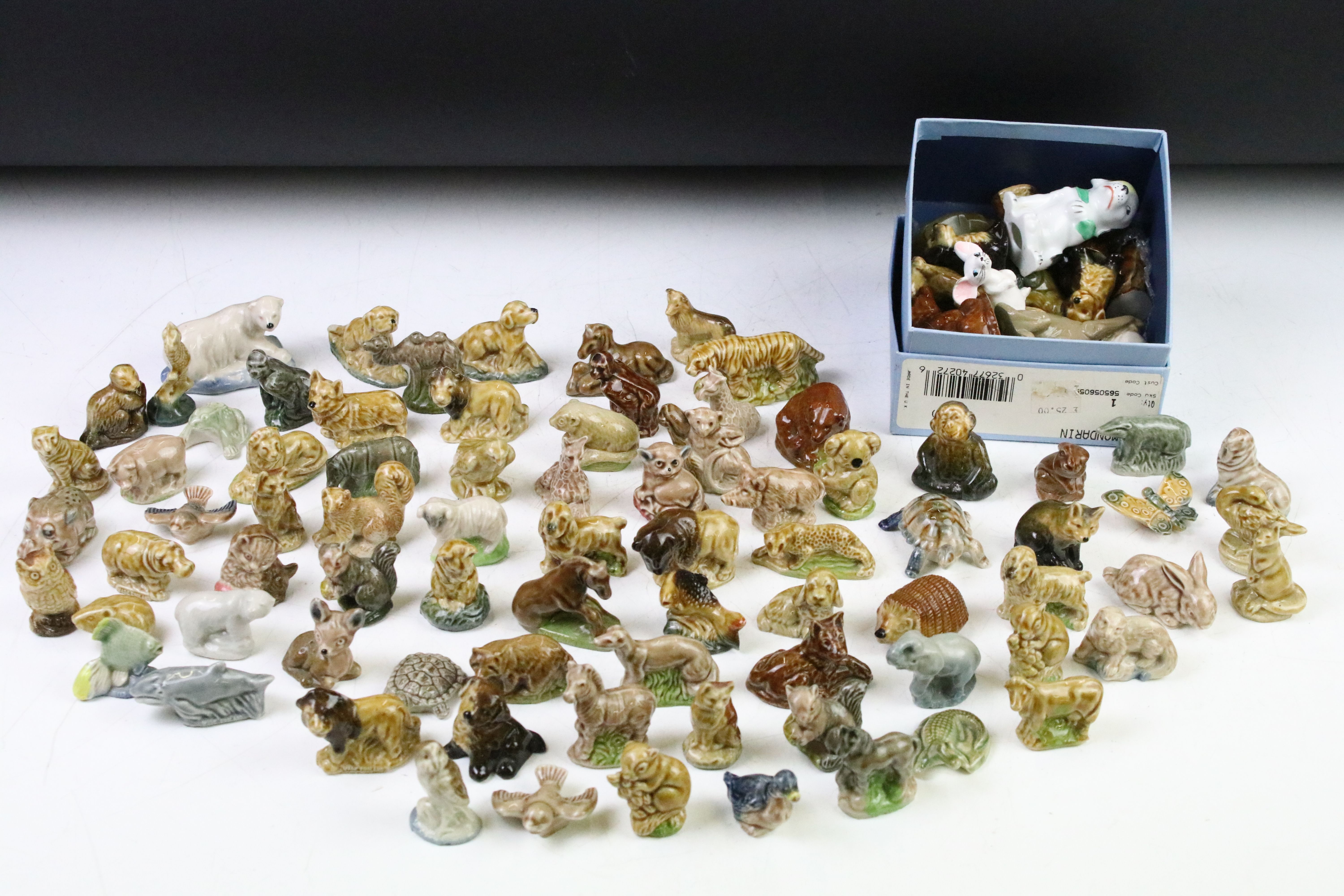 Collection of Wade ceramic animals, mostly Wade Whimsies, also featuring Disney examples