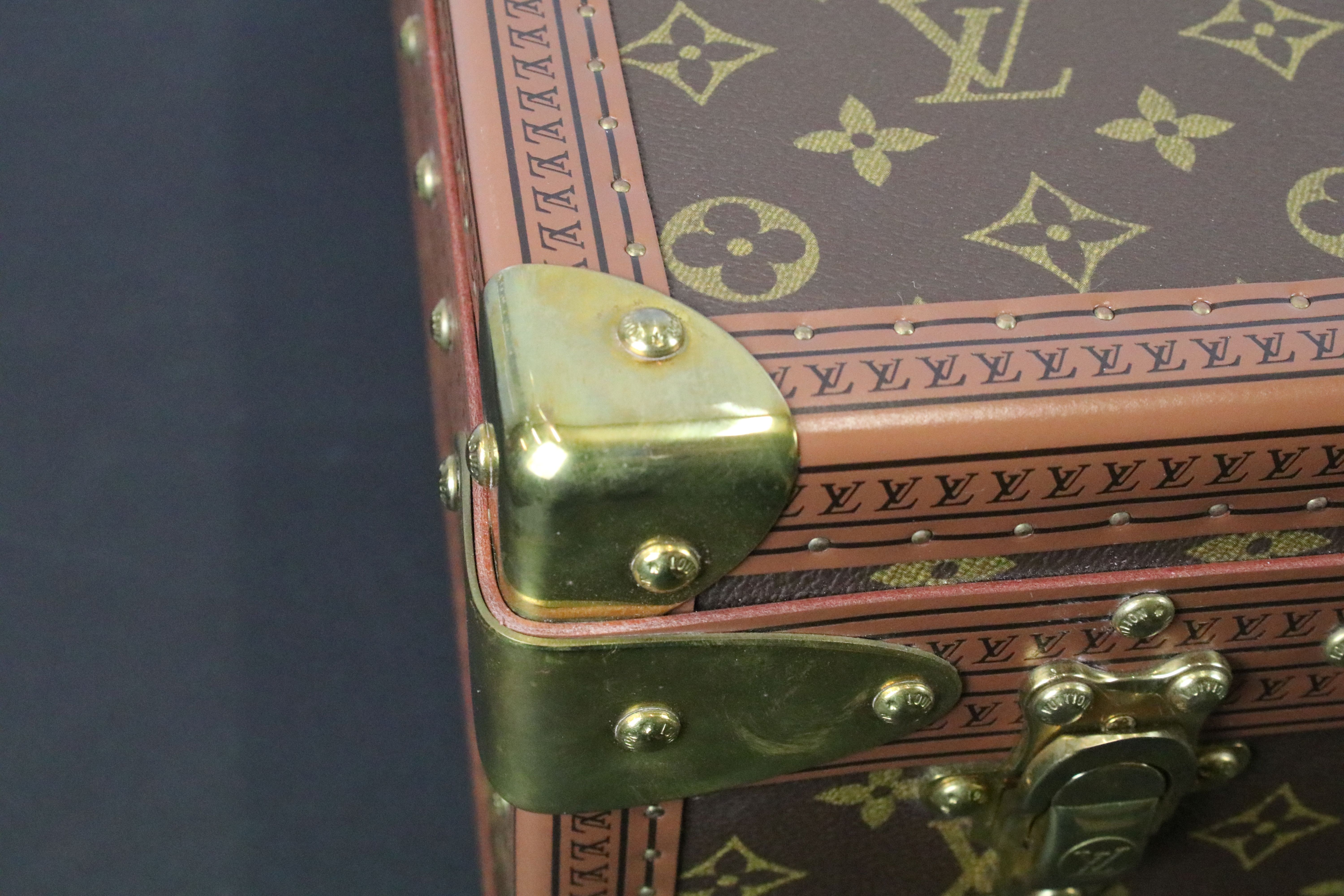 Louis Vuitton - Monogrammed canvas trunk with brass fittings and lock, opening to reveal beige - Image 12 of 17