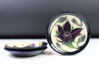 Three Moorcroft pottery pin dishes to include Butterfly & Berries (signed to reverse),