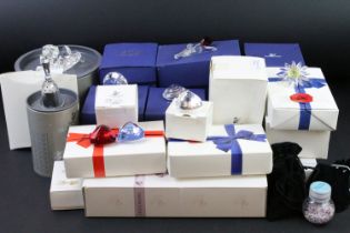 Collection of Swarovski Crystal to include over 20 boxed examples, featuring SCS joining / renewal