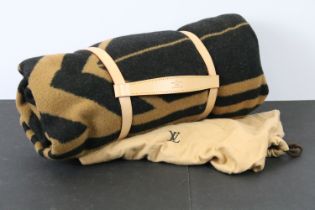 Louis Vuitton - Brown and black pattern picnic blanket with leather carrying handle and dust bag.