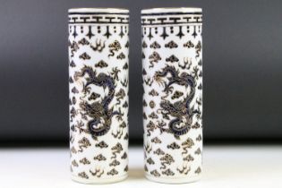 Pair of Chinese Porcelain Sleeve Vases, hand painted with dragons amongst clouds and flames,