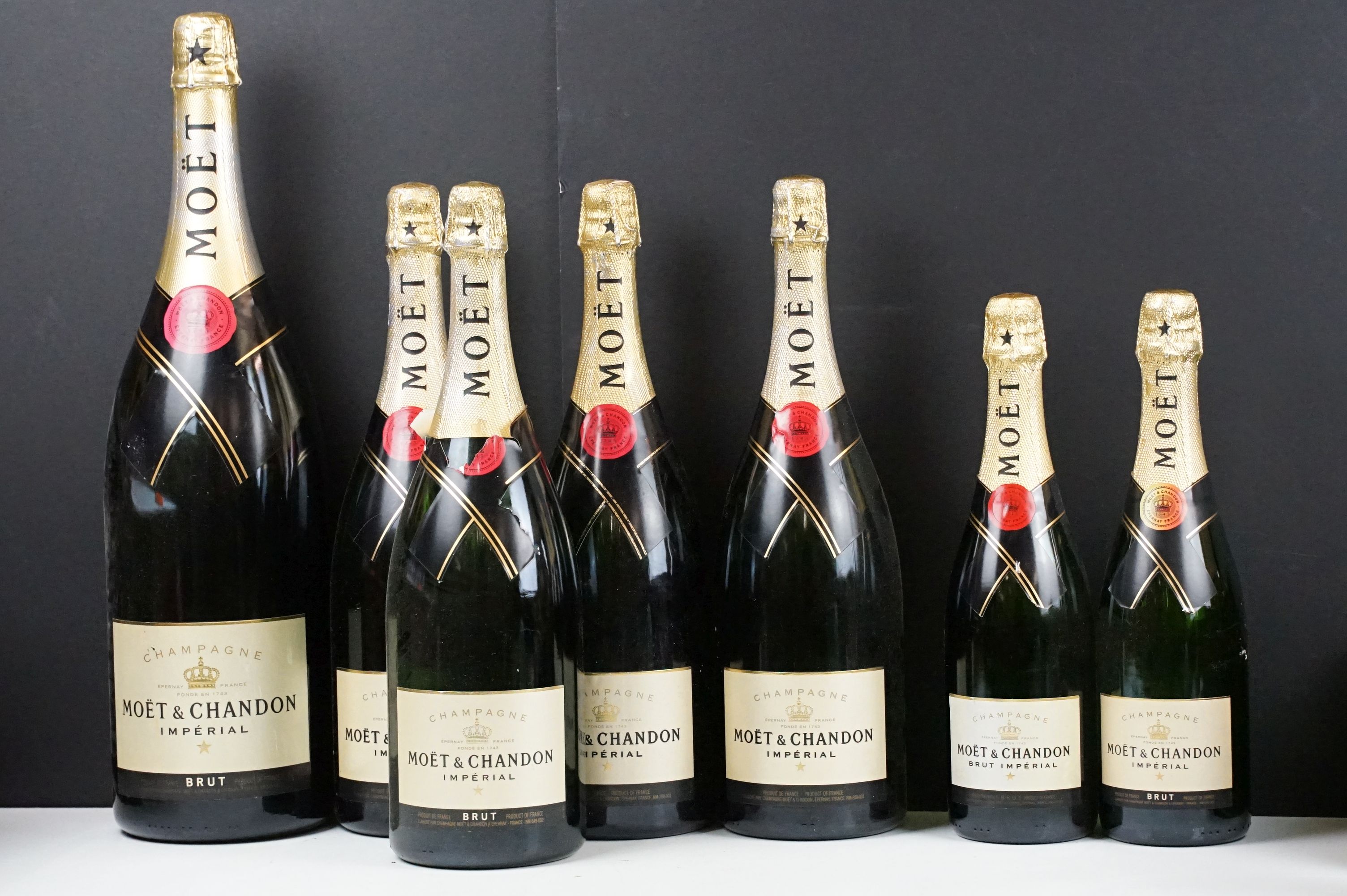 Collection of Moet & Chandon imperial champagne dummy bottles. Seven in total of various sizes.