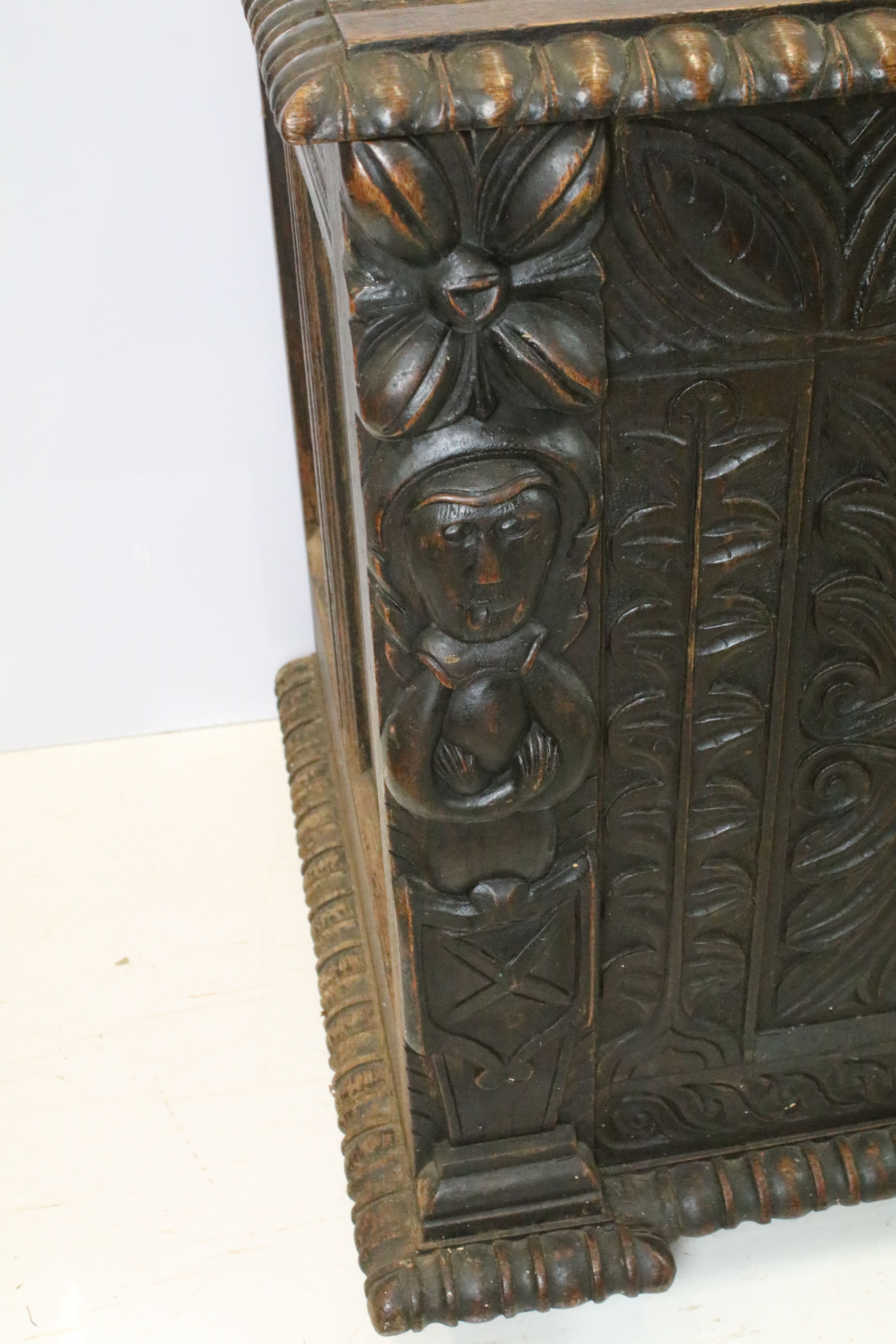 19th century carved oak chest of substantial proportions, the four panelled lid above carved - Image 6 of 7