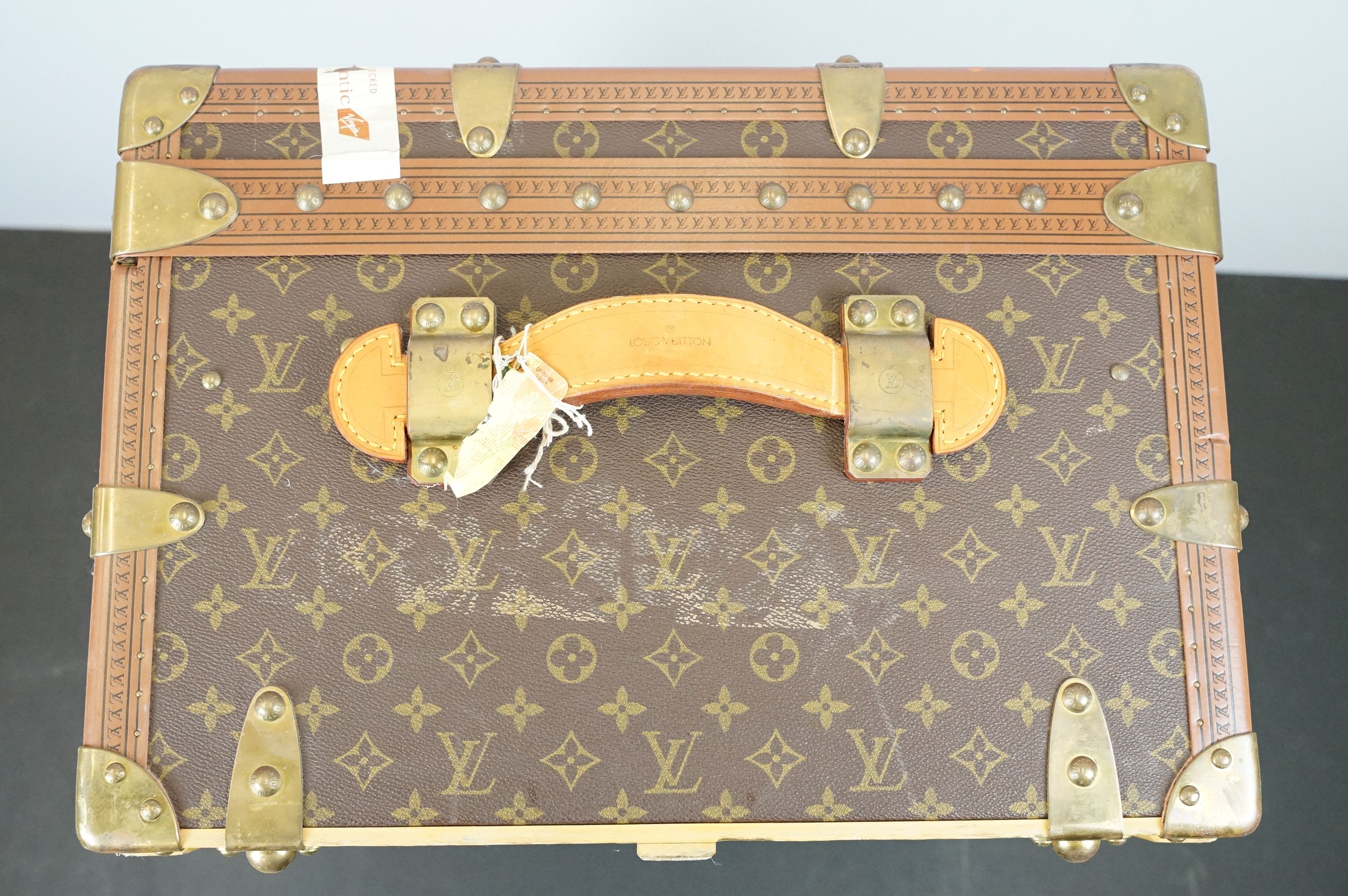 Louis Vuitton - Monogrammed canvas travel trunk having branded leather banding, wooden slats, - Image 18 of 32