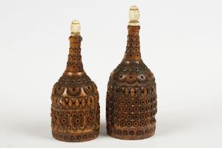 Two 19th century Coquilla Nut carved scent or snuff bottles with screw on bone lids, tallest 10cm