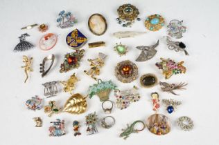 A collection of mainly vintage pin brooches to include silver.