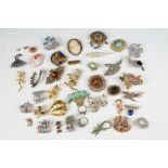 A collection of mainly vintage pin brooches to include silver.