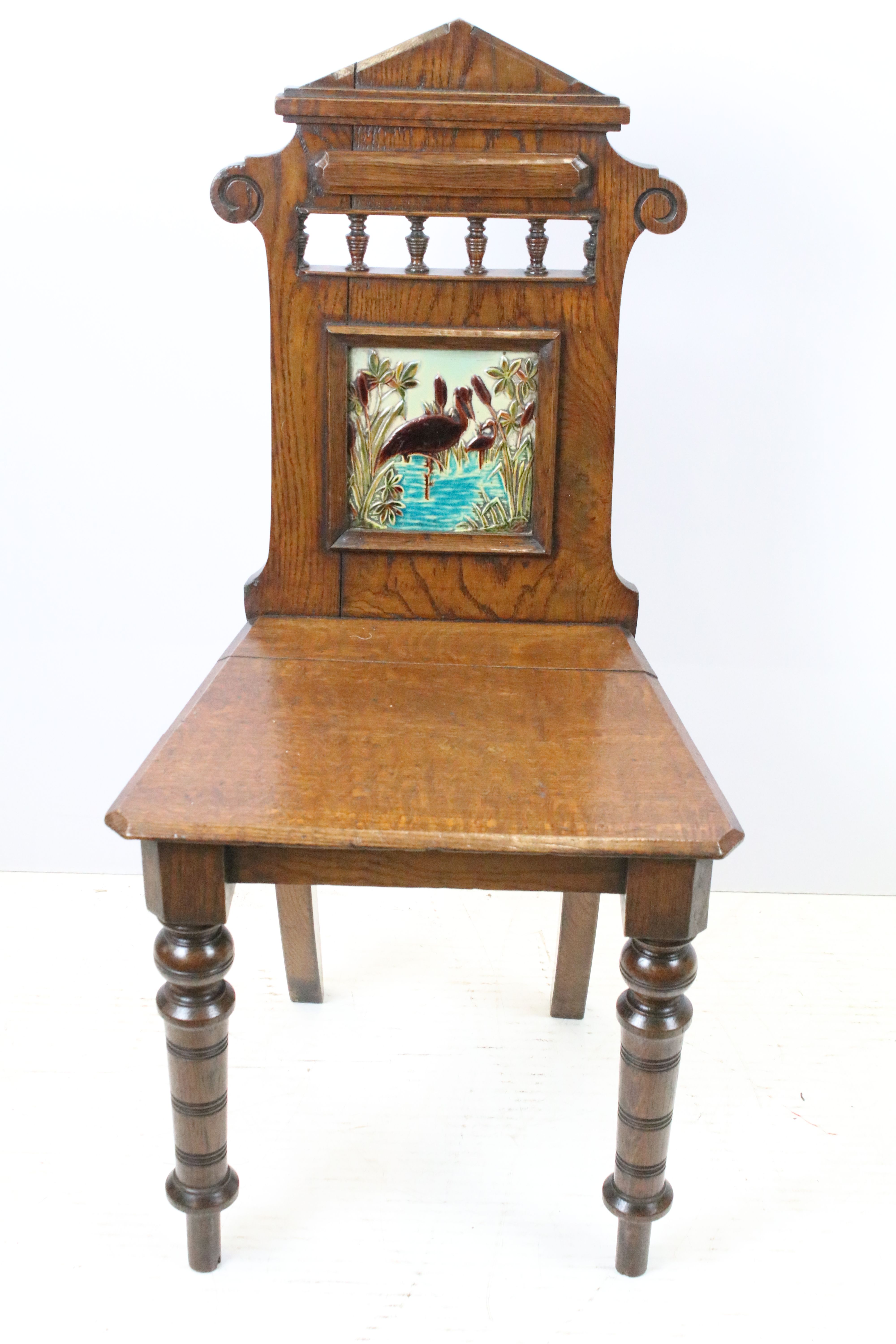 Victorian oak hall chair with Majolica inset tile to back, 90cm high x 44cm wide x 36cm deep - Image 2 of 5