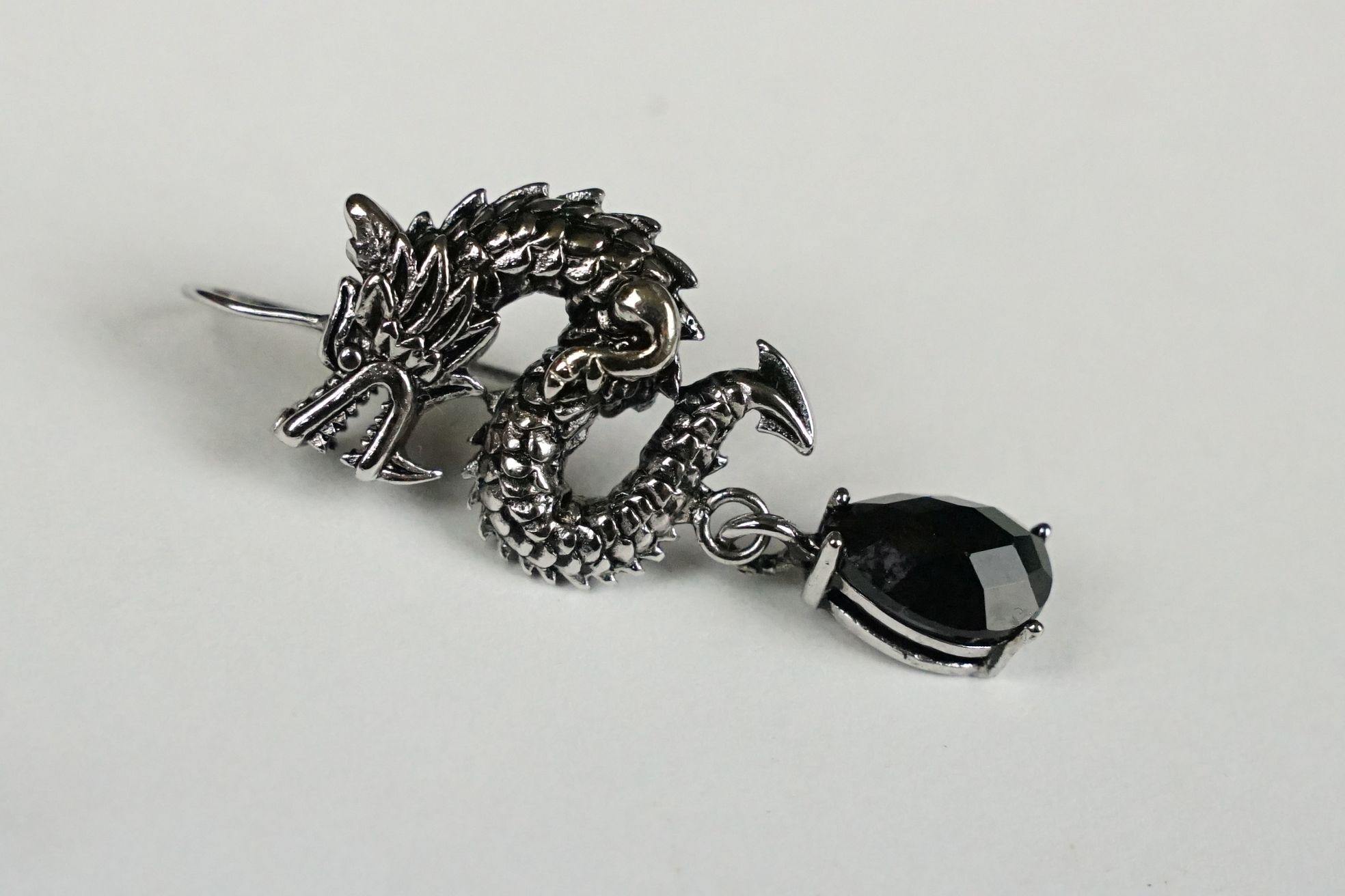 A pair of 925 sterling silver earrings in the form of Chinese dragons with faceted stone drops, - Image 2 of 4