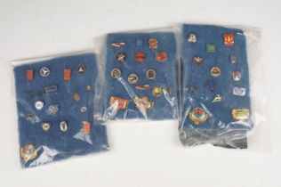 A collection of automotive / car advertising pin badges