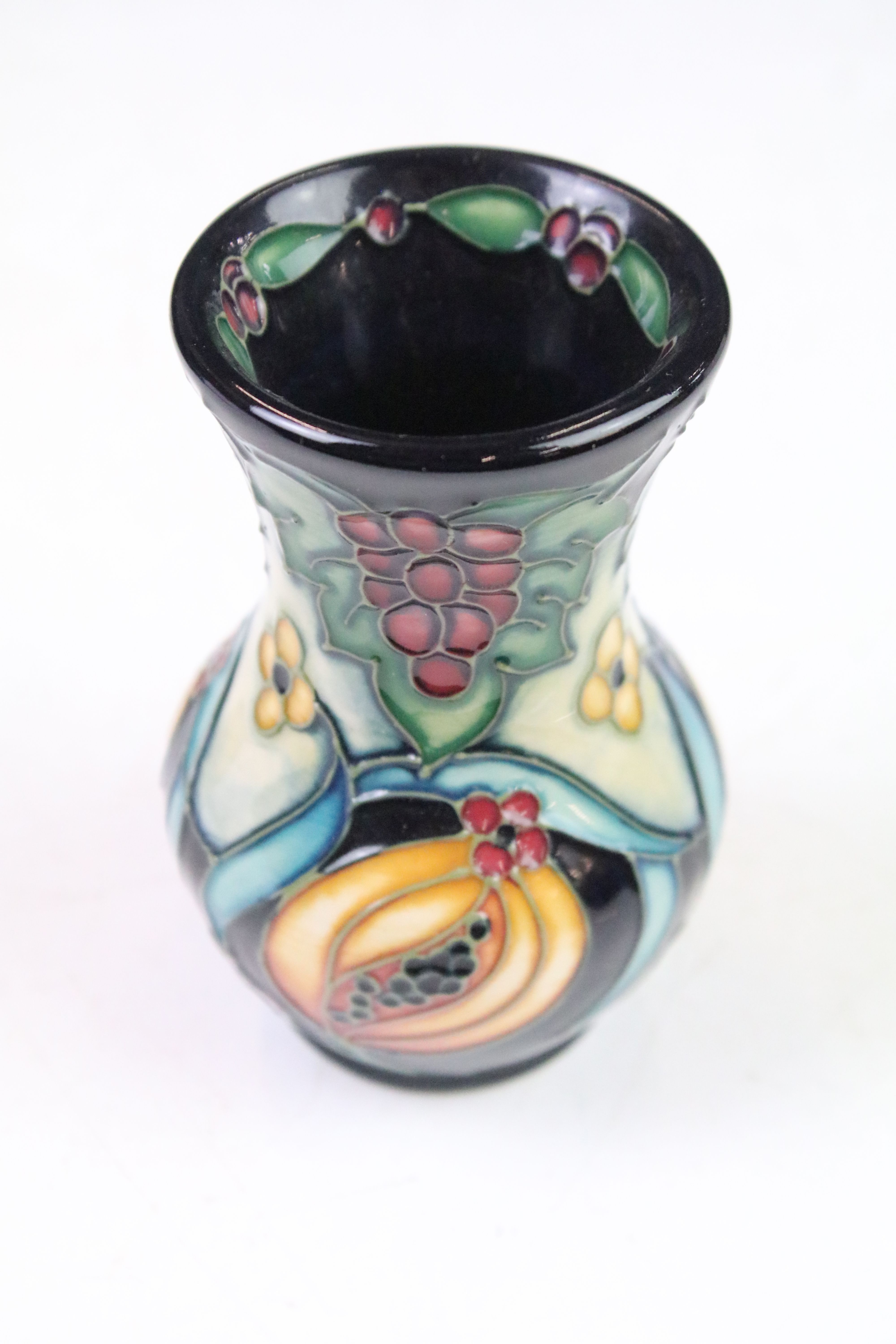 Two boxed Moorcroft pottery vases to include a Celtic Web vase (10.5cm high) and a 'Fruits' - Image 8 of 9