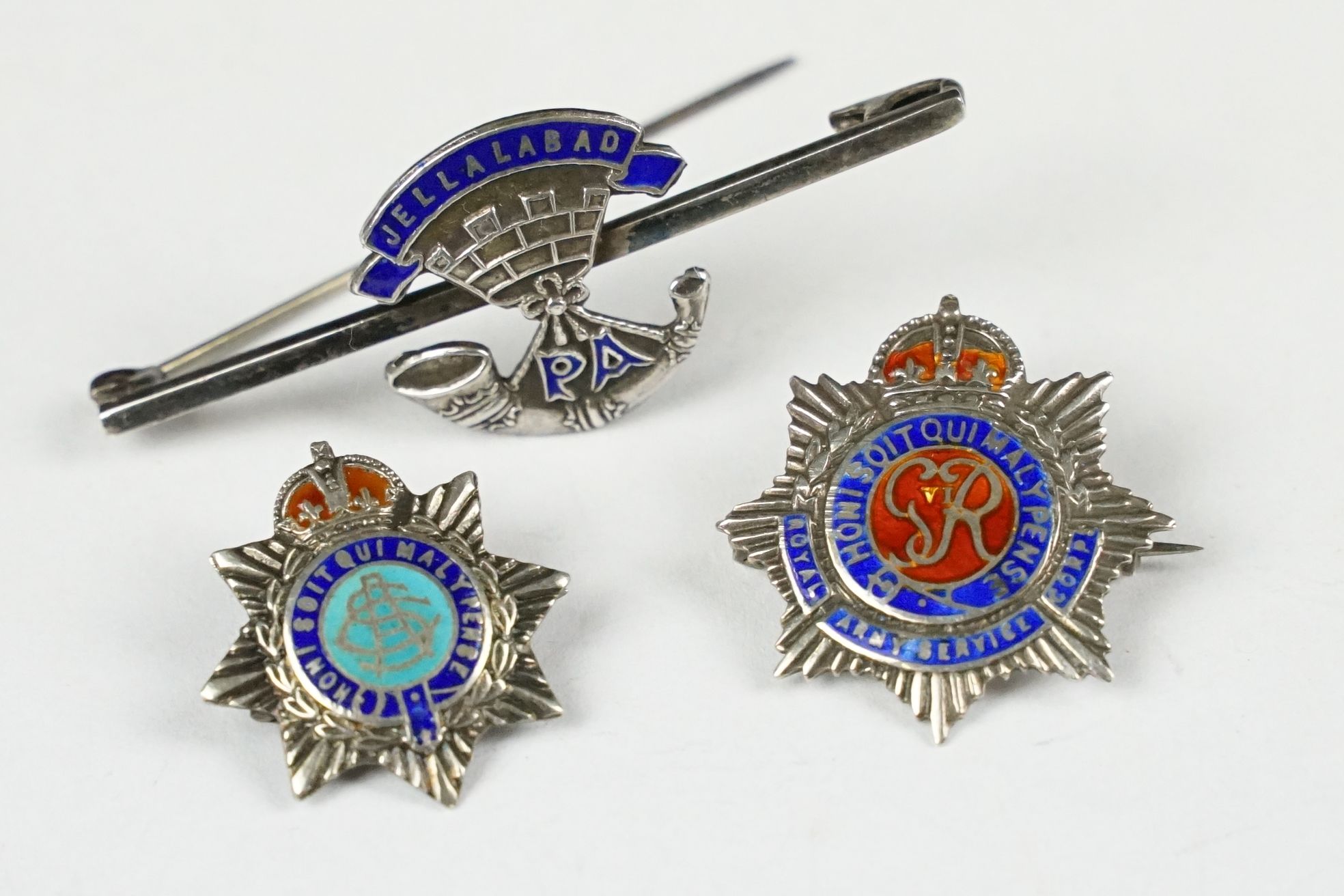 Three Sterling Silver and Enamel Military Badges / Brooches including Jellalabad Somerset Light