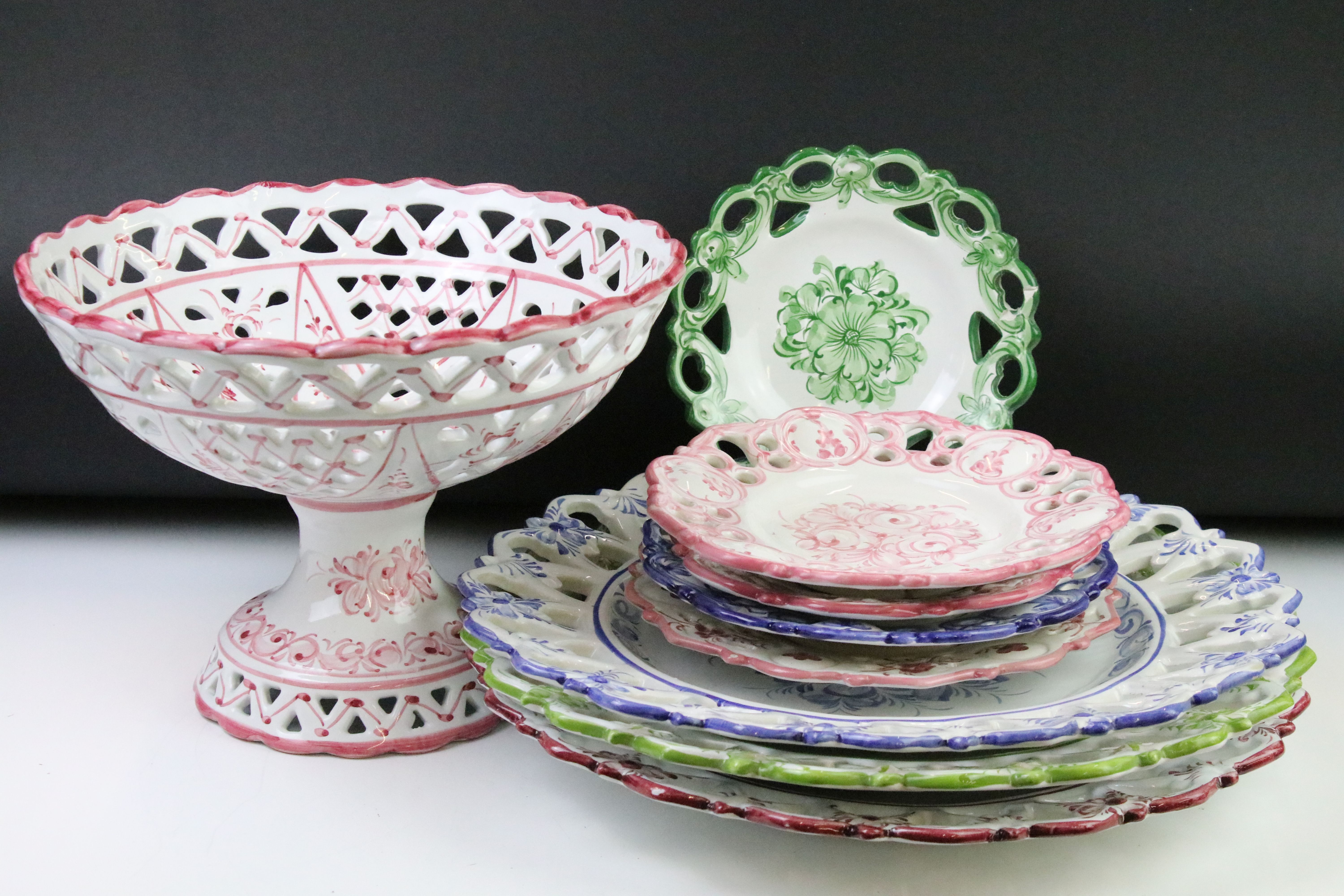 Collection of Portuguese ceramics to include five small wall plates and three large wall plates, all