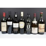Six bottles of wine and alcohol to include 1986 Chateau Cabut, 2011 Pillastro Primitivo, 1989