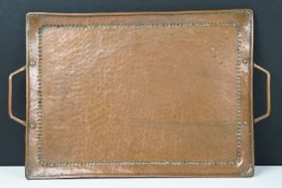 Arts and Crafts hammered copper twin-handled tray, stamped J.P. to underside, maker's mark for