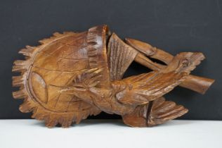 Black Forest carved wooden Wall Pocket in the form of a hunting bag with game bird, approx 18cm high