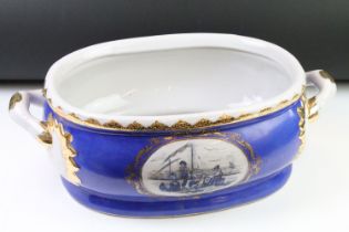 Ceramic Footbath of oval form with twin handles decorated with panels of sailors and boats by a