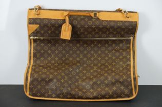 Louis Vuitton - Garment bag having a monogrammed body with tanned leather handles and woven shoulder