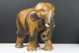 Carved teak model of an elephant, approx 41cm high