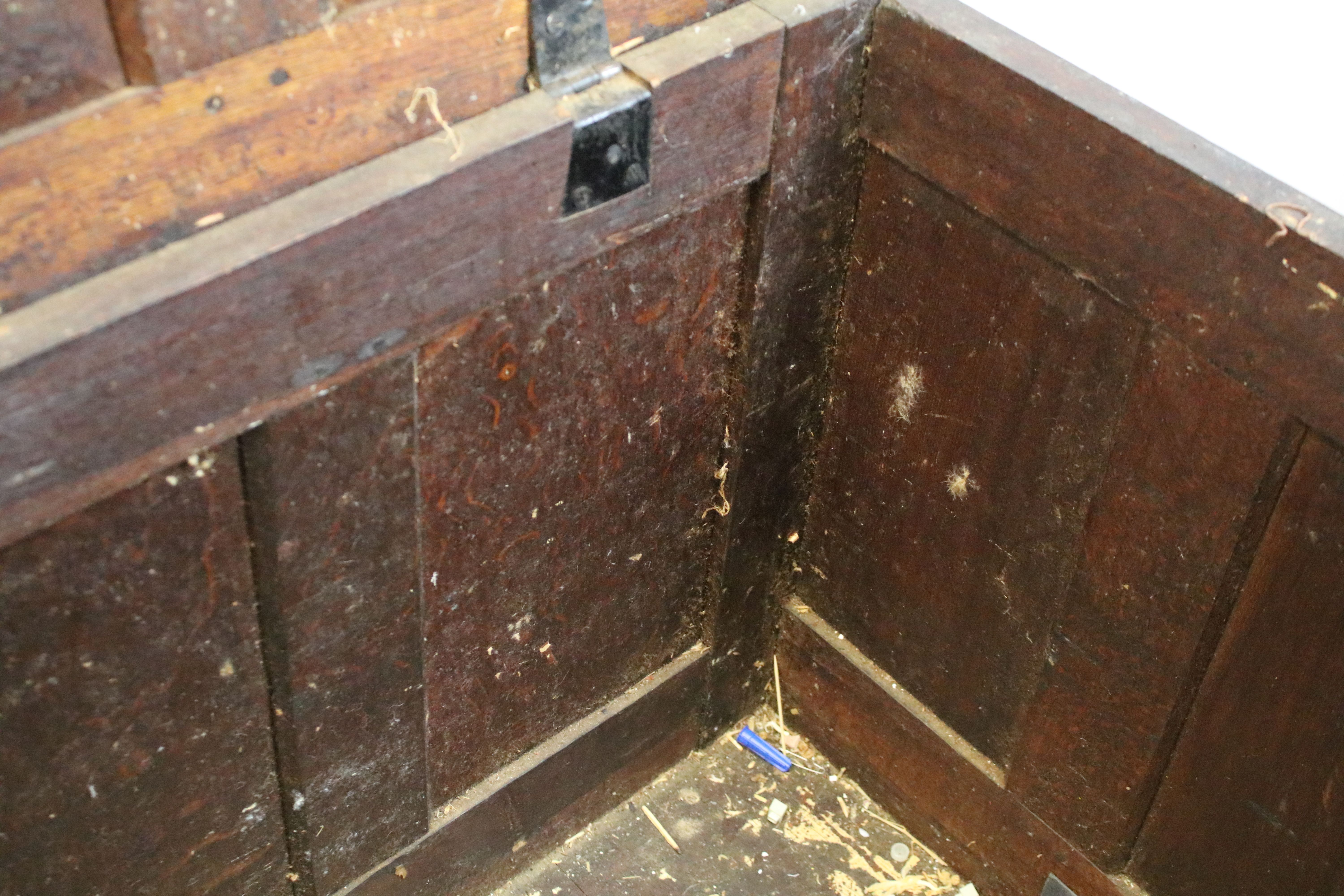 19th century carved oak chest of substantial proportions, the four panelled lid above carved - Image 4 of 7