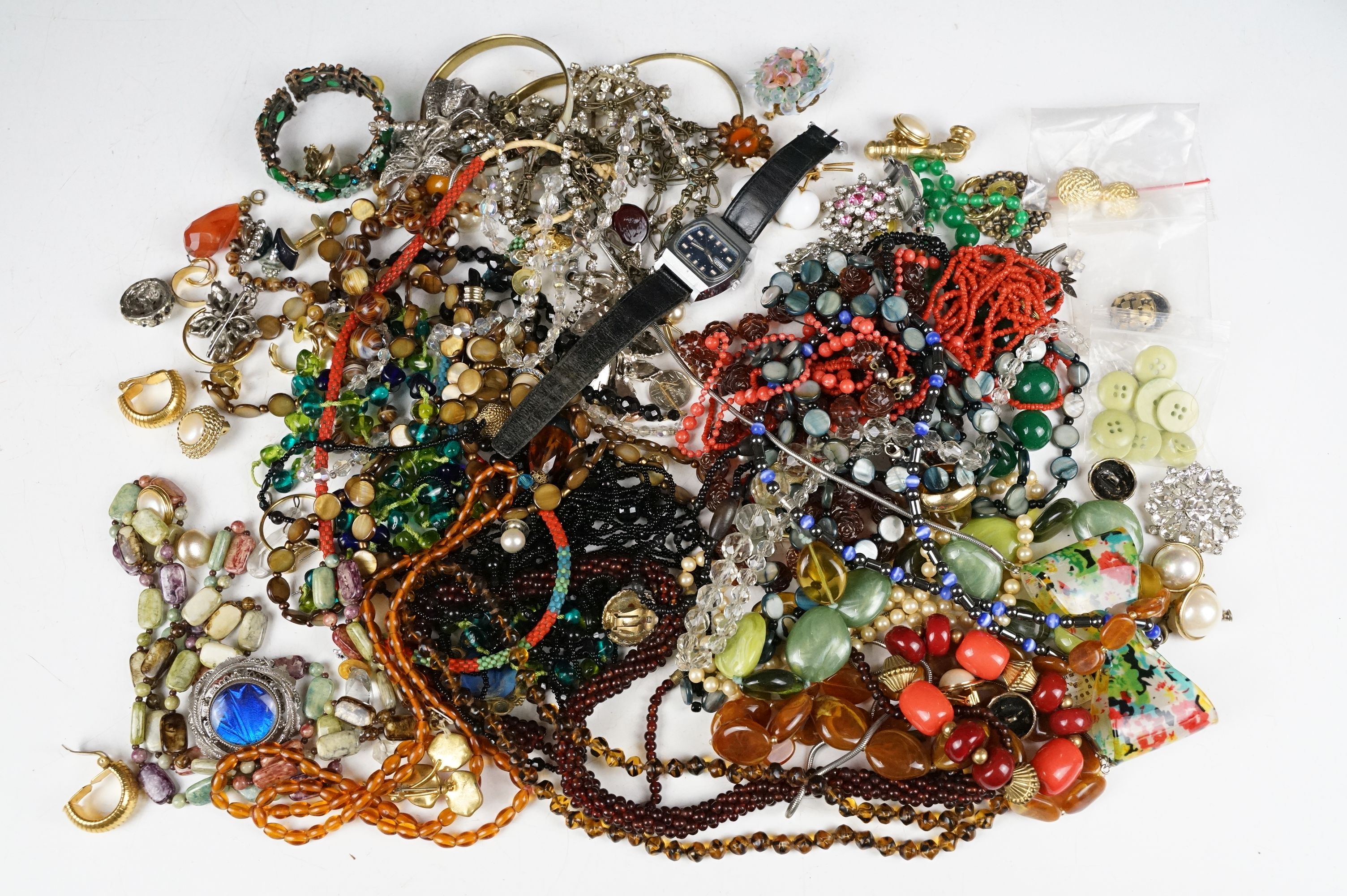 A collection of mainly vintage costume jewellery to include beaded necklaces, wristwatch,