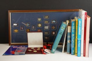 A collection of Butlins memorabilia to include books, badges, cassette and ephemera.