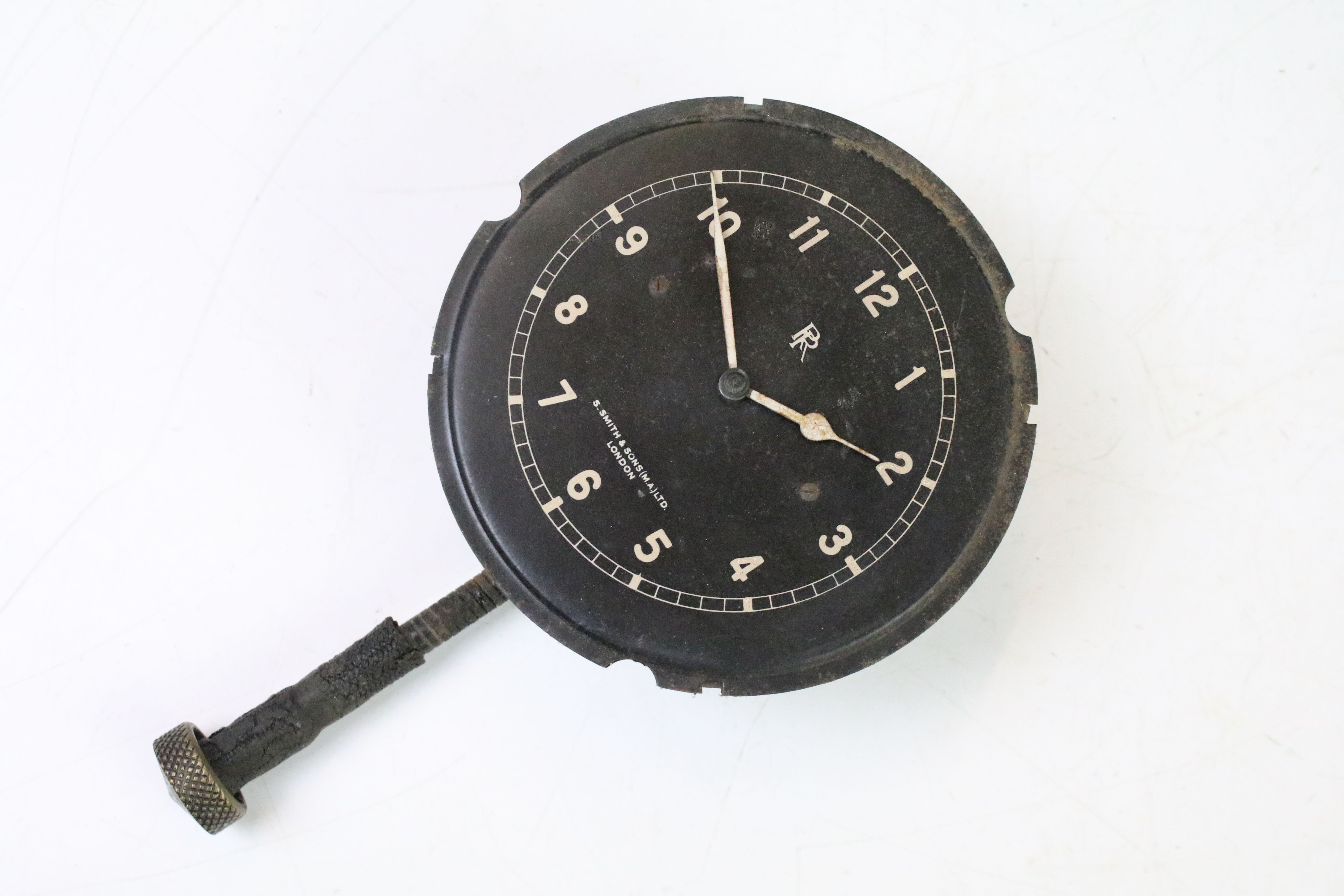 Automobilia - A Smith & Sons Rolls Royce clock with white Arabic numerals on a black face, with