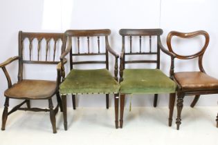 Pair of 19th century mahogany chairs with arms, the backs with turned spindles and reeded arms, each