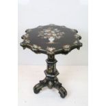 Victorian Papier Mache Tilt Top Table, the shaped top with mother of pearl and gilt decoration