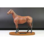 Beswick 'Arkle' connoisseur model racehorse with matt finish, raised on an oblong wooden base,