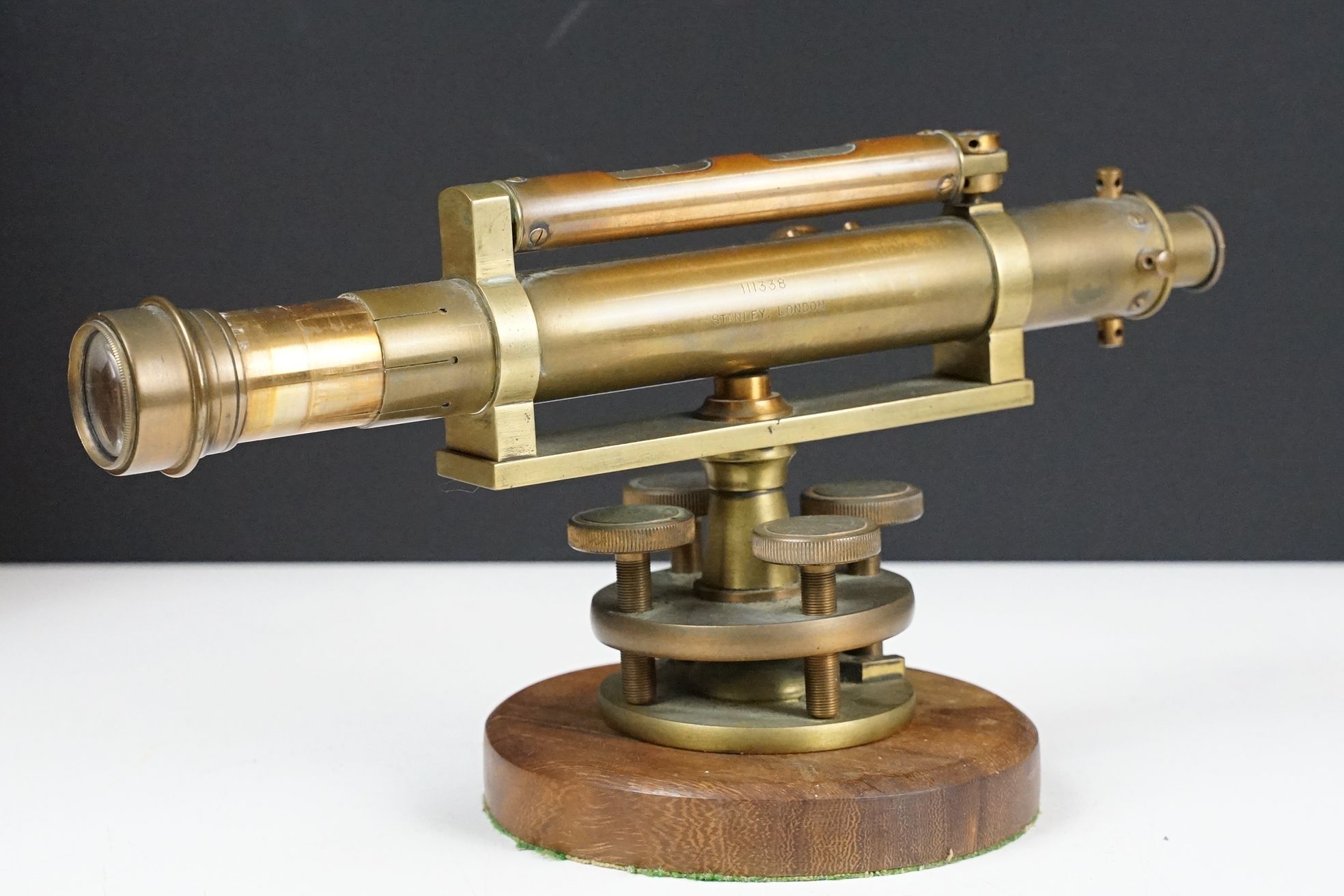 Stanley brass theodolite, barrel marked ' 111338 Stanley, London ' with circular wooden stand and - Image 4 of 10