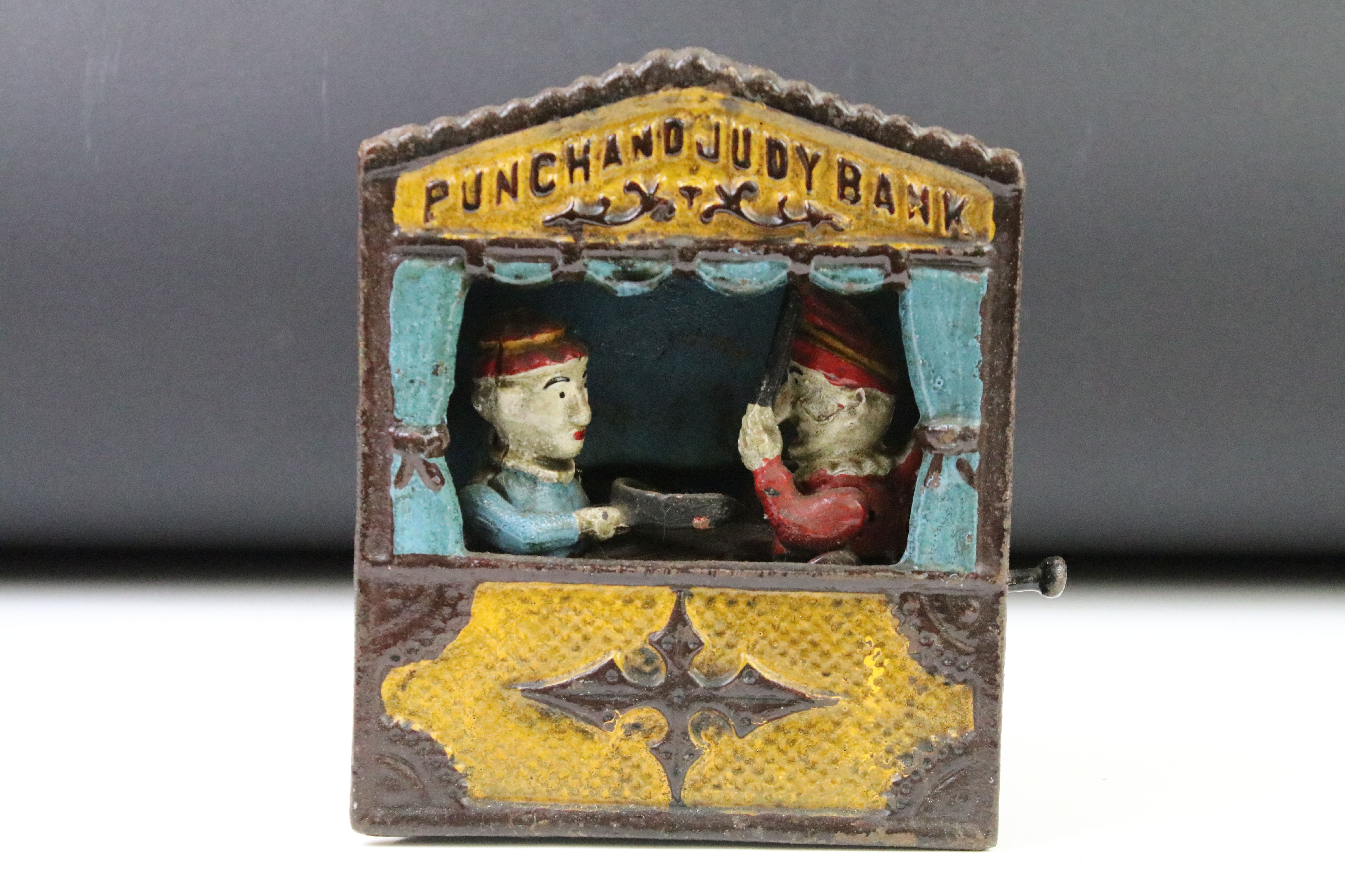 Two reproduction cast iron money boxes to include a Punch and Judy box and an Uncle Sam example. - Image 4 of 5