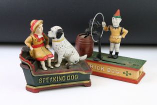 Two reproduction cast iron novelty money boxes to include trick dog and speaking dog. Widest