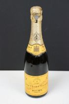 A bottle of 1947 Veuve Clicquot Ponsardin Champagne. Measures 27cm tall.