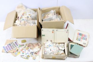 Two boxes of assorted world kilo ware stamps.