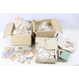 Two boxes of assorted world kilo ware stamps.