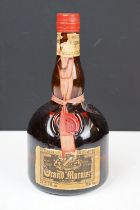 Orange and Fine Old Grand Marnier Cognac Brandy liquor. 67.4% proof 24 2/3 fl oz. Sealed. Circa
