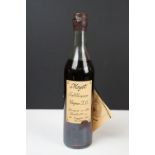 A bottle of Moyet fine champagne Cognac X. O. Bottle Number 1474 of 1930. 0,70l, 40% vol. Sealed.